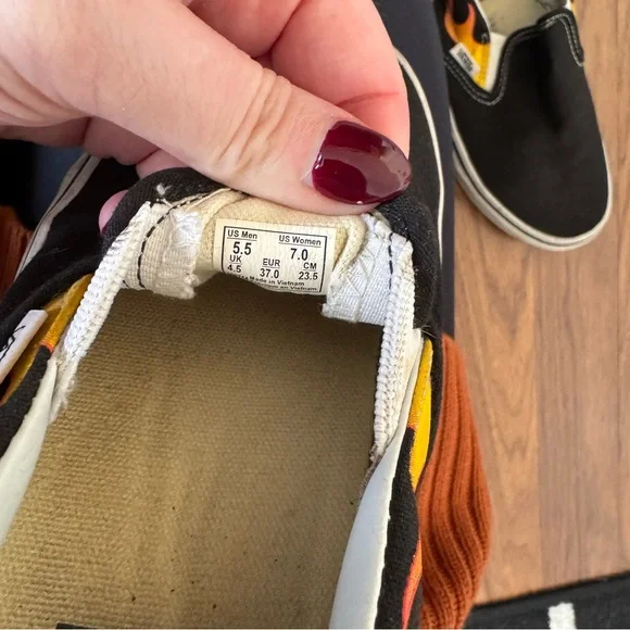 Vans Black Slip-Ons with Red and Yellow Flame Pattern - Picture 6 of 7